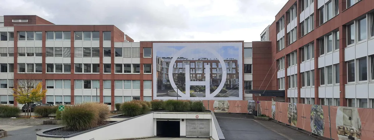 Bauzaunwerbung mit Banner